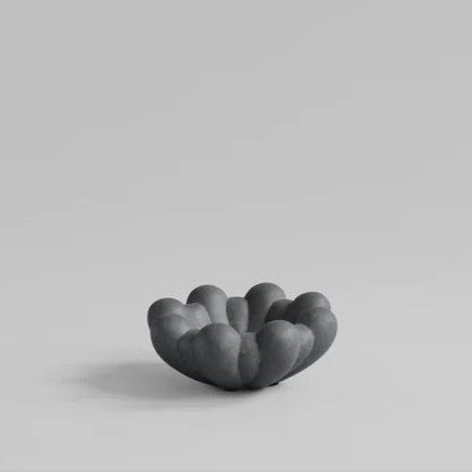 Studio lighting, neutral background, perspective view of a decorative tray