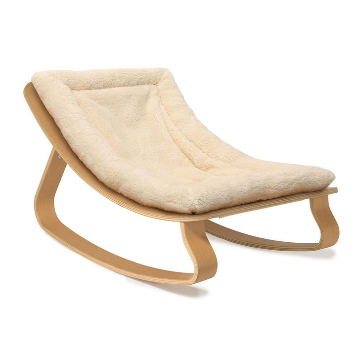 CHARLIE CRANE Levo Baby Rocker in Beech with Fur Milk Cushion