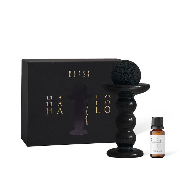 A set of Halo Lava Rock Diffuser with vetiver, fig, moss and chedarwood notes