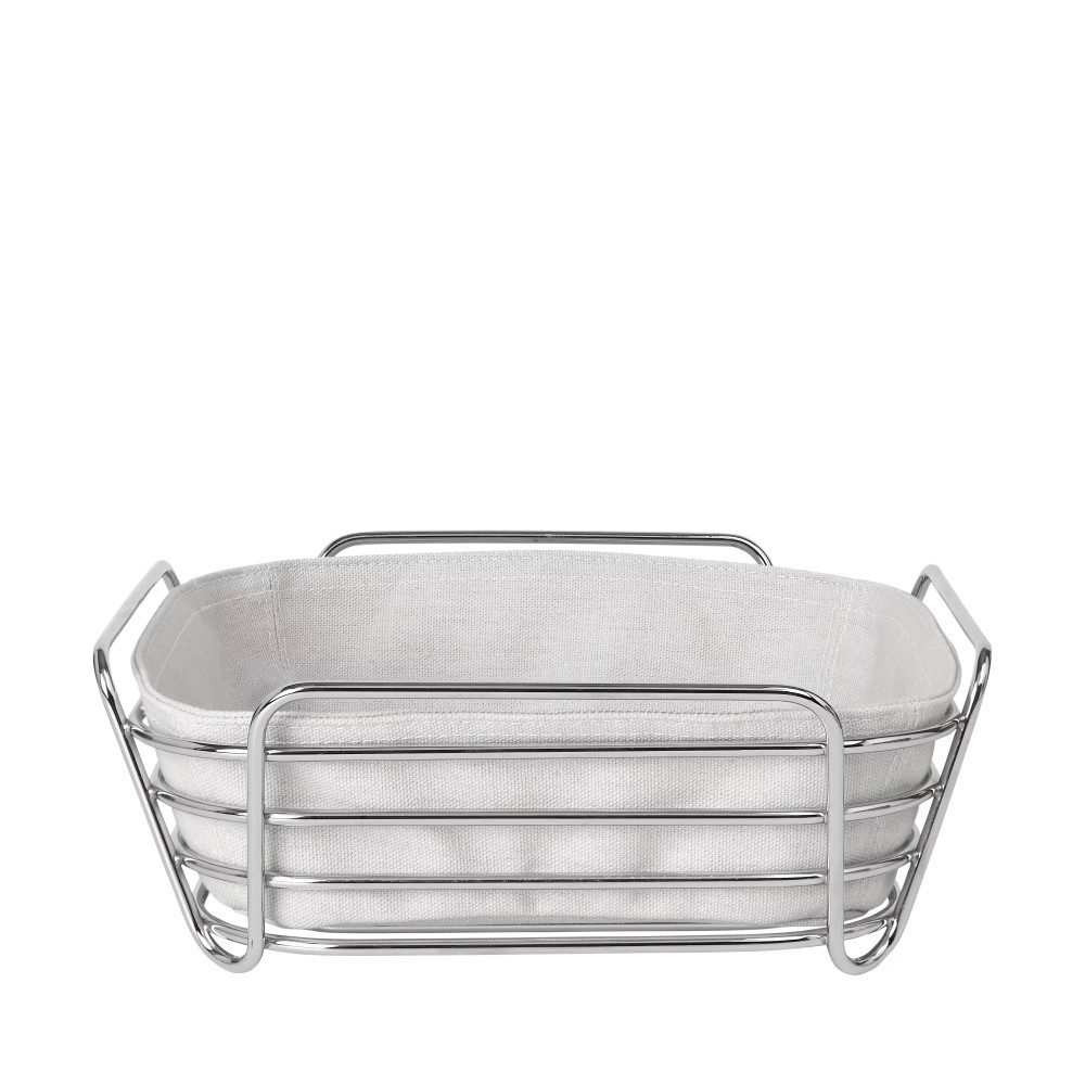 A grill-shaped bread basket with its matching cloth at the center.