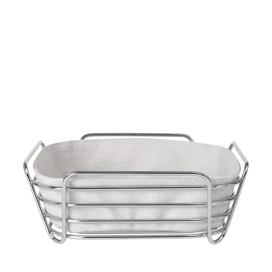 A grill-shaped bread basket with its matching cloth at the center.