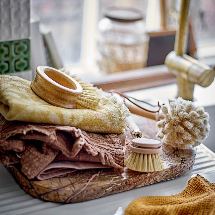 Deborah serving tray made from marble in brown as a decorative tray in a contemporary bathroom.