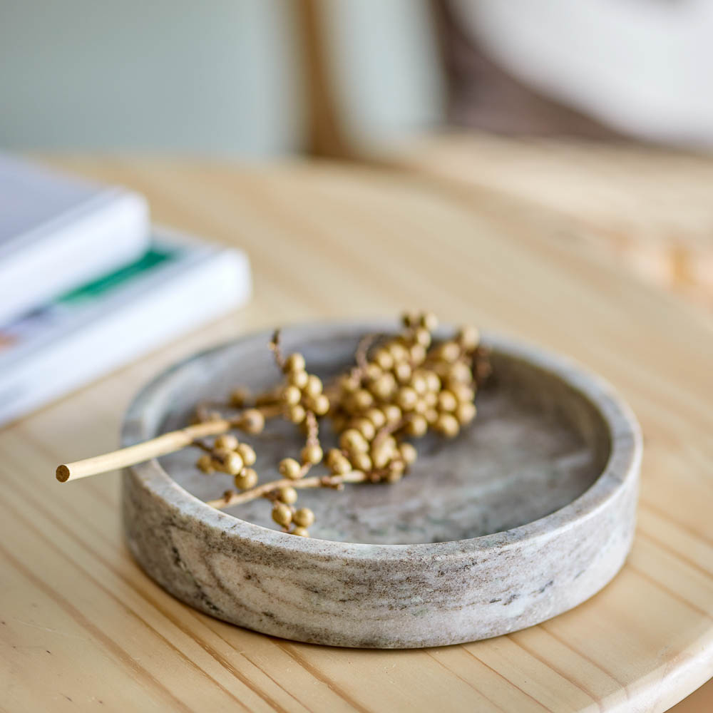 Ivette marble tray for food display and jewellery storage is a contemporary statement in a modern house.