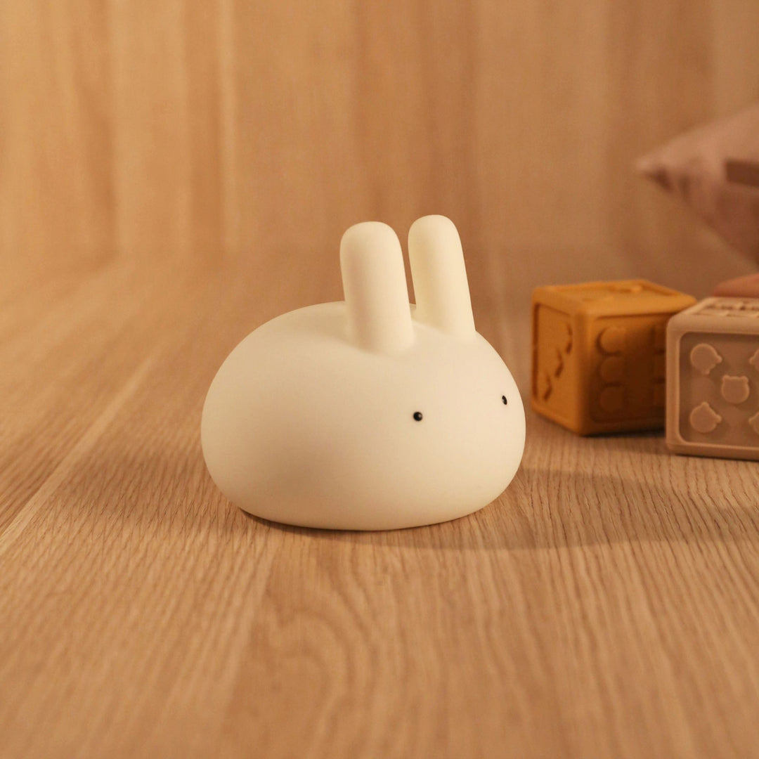 Designstuff Lapin Rabbit Night Light on a wooden floor