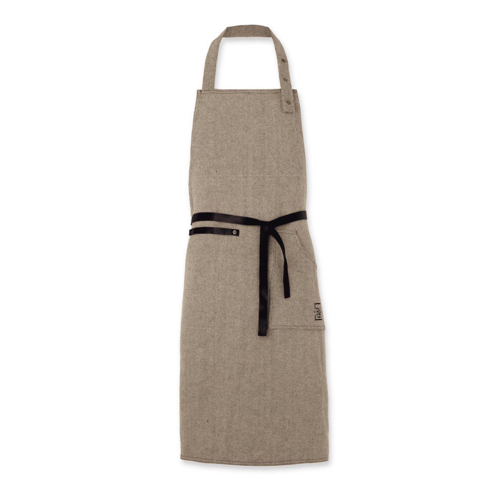 Studio lighting, white background, perspective view of a dark grey apron with a black leather belt on the waist area,