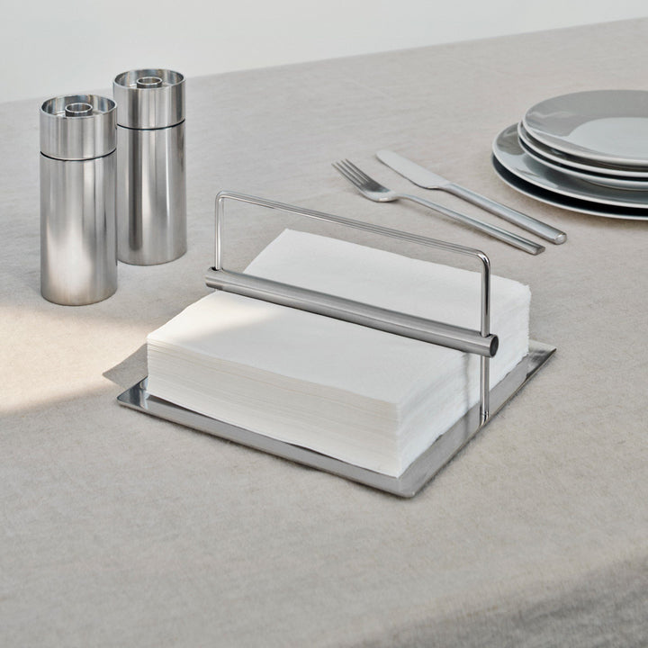 STELTON Original Napkin Holder in Stell on a table