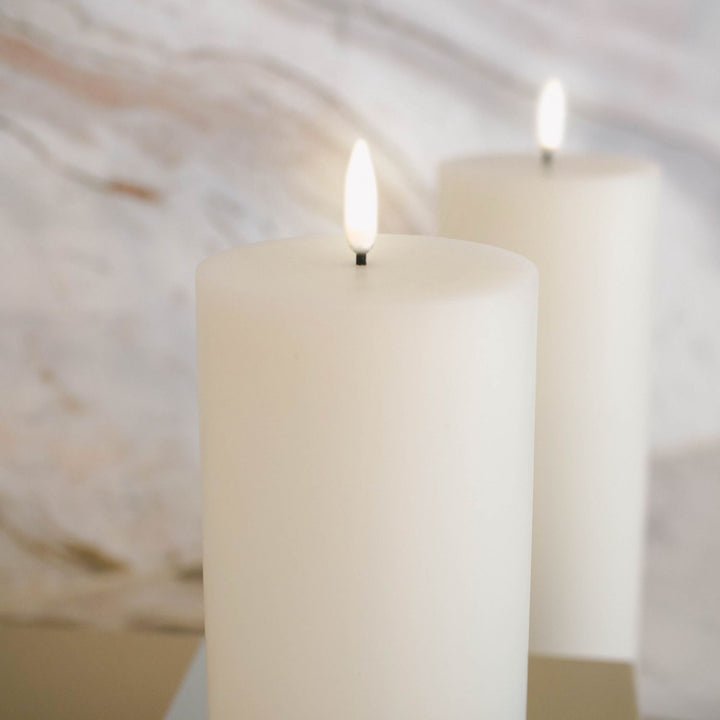 UYUNI LIGHTING Flameless Pillar Candles close up on the flame