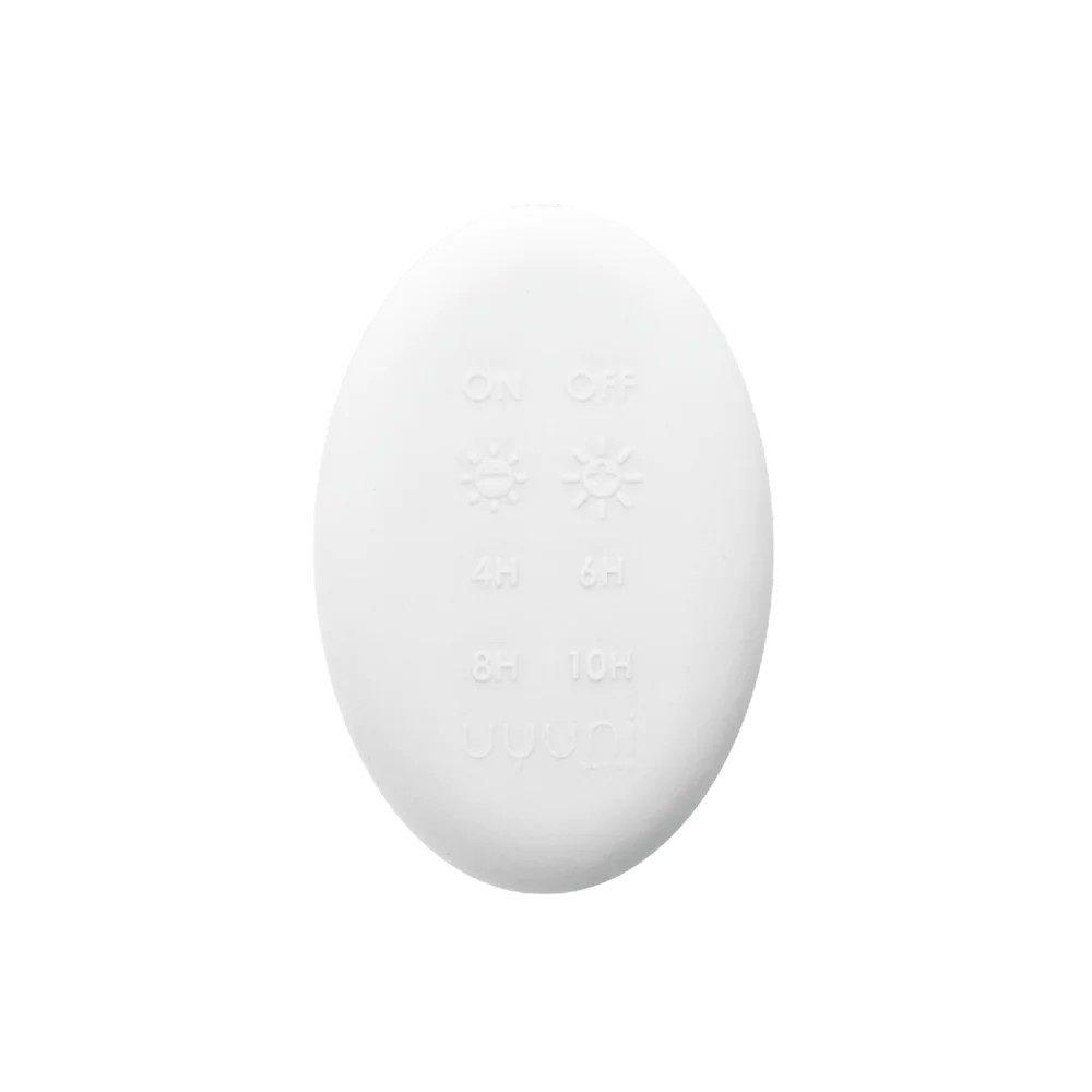 An oval-shaped remote controller for Uyuni's flameless candles series.