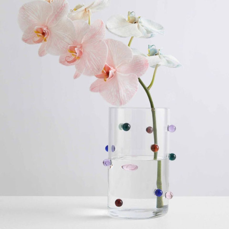 The Maison Balzac Pomponette Vase styled with a floral stem