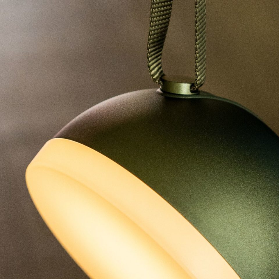 A photo of the New Works portable sphere lamp in green