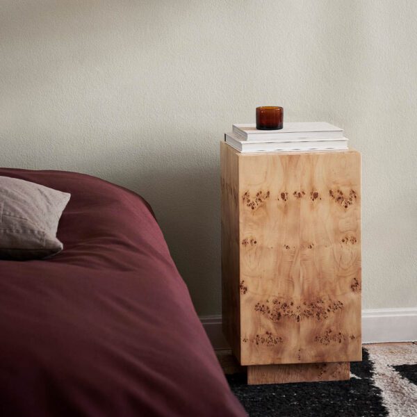 The Burl Side Table in the bedroom from certified burl wood by ferm Living.